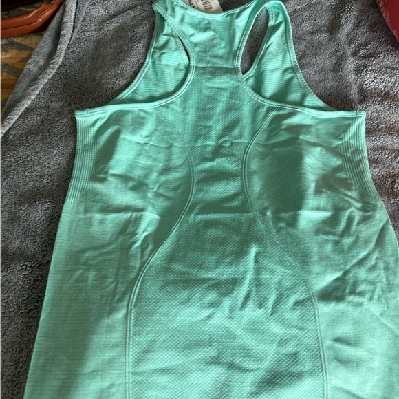 Zyia action wear top. Turquoise copper charged tank - Picture 5 of 5